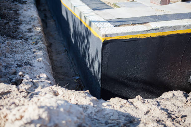 Professional Wet Basement Repair technician working in Arlington, NY